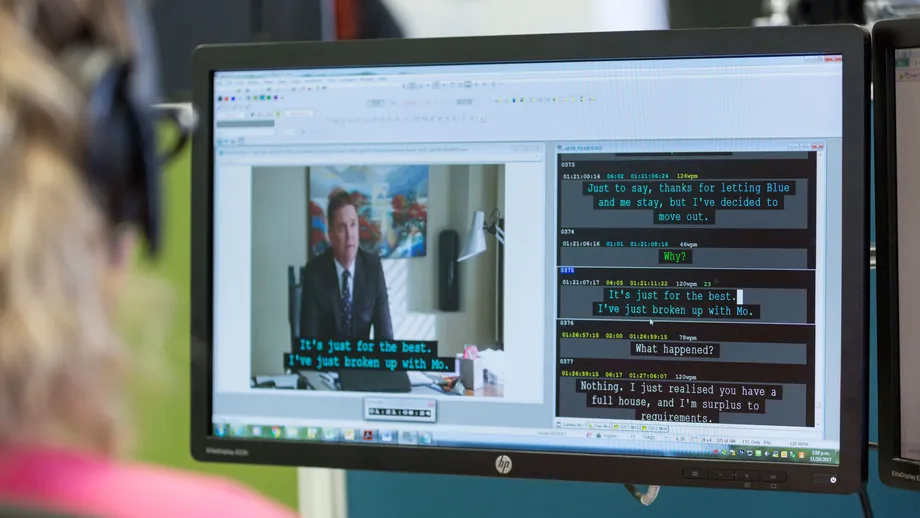 A captioner at work adding subtitles to screen content